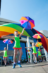 Image showing The girls performed a dance with umbrellas