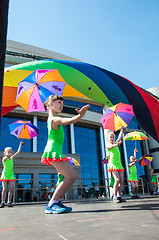 Image showing The girls performed a dance with umbrellas