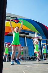 Image showing The girls performed a dance with umbrellas