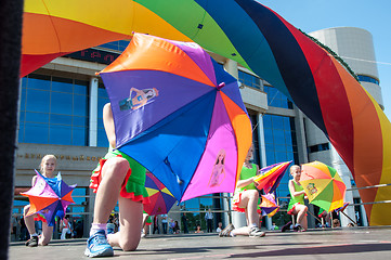 Image showing The girls performed a dance with umbrellas