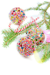 Image showing Green spruce with Christmas balls and candy canes