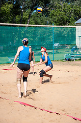 Image showing Beach volleyball play girls