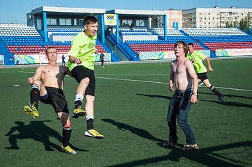 Image showing Boys play football