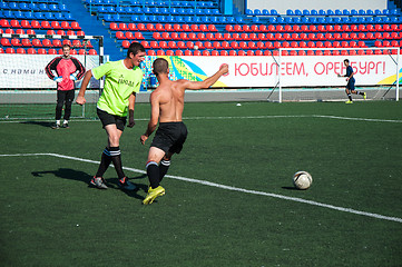 Image showing Boys play football