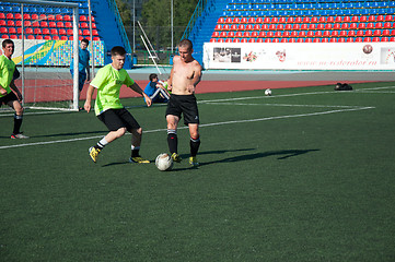 Image showing Boys play football