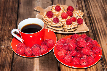Image showing Ripe raspberry and coffee cup, 