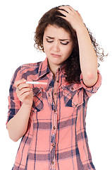 Image showing Girl with pregnancy test