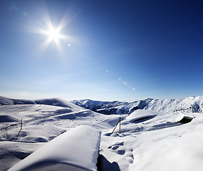 Image showing Ski resort and sky with sun