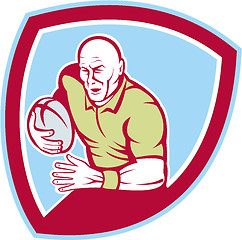 Image showing Rugby Player Running Charging Shield Cartoon