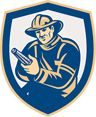 Image showing Fireman Firefighter Aiming Fire Hose Shield Retro