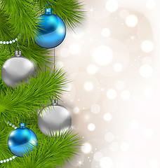 Image showing Christmas glowing background with fir branches and glass balls