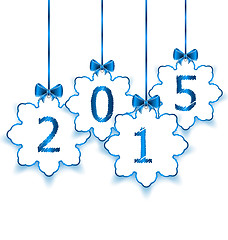 Image showing Happy new year in hanging paper snowflakes with bows