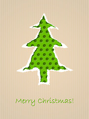 Image showing Ripped paper christmas card with dotted green tree