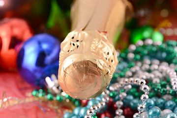 Image showing Christmas background with wine bottle and pearls