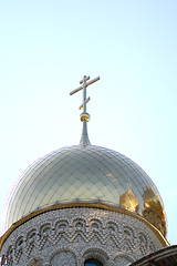 Image showing Golden cupola and christian cross on church against blue sky