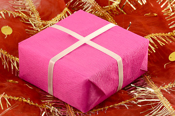 Image showing red gift box with white ribbon bow