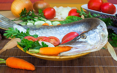 Image showing Fish and components for her preparation: vegetables, spices, par