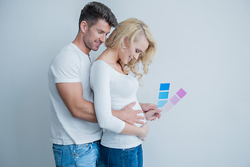 Image showing Sweet Middle Age Couple Feels Baby at Womb