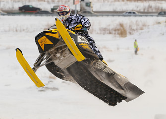 Image showing Sport snowmobile jump