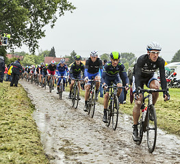 Image showing The Peloton on a Cobbled Road- Tour de France 2014