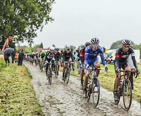 Image showing The Peloton on a Cobbled Road- Tour de France 2014