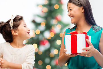 Image showing happy mother and child girl with gift box