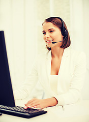 Image showing friendly female helpline operator