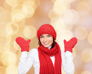 Image showing smiling young woman in winter clothes