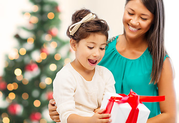 Image showing happy mother and child girl with gift box