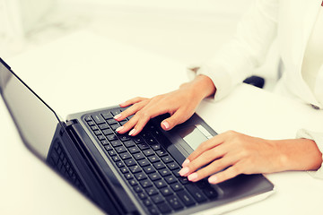 Image showing businesswoman using her laptop computer