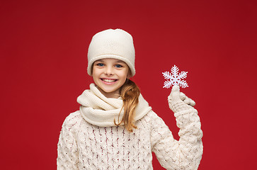 Image showing girl with big snowflake