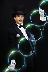 Image showing magician showing trick with linking rings