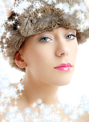 Image showing lovely beauty in winter hat with snowflakes