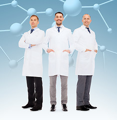 Image showing group of smiling male doctors in white coats