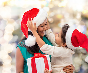 Image showing happy mother and child girl with gift box