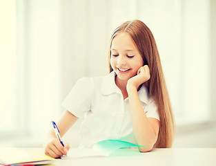 Image showing student girl studying at school