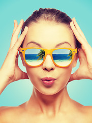 Image showing amazed teenage girl in sunglasses