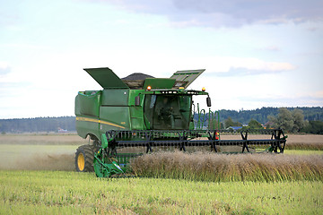 Image showing John Deere Combine on Rapeseed Field