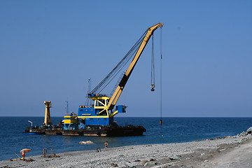 Image showing The floating crane on the seacoast