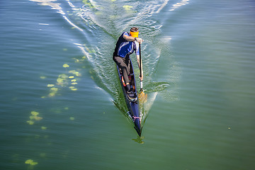 Image showing Man rowing in a canoe 