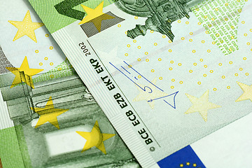 Image showing Close up macro detail of euro money banknotes