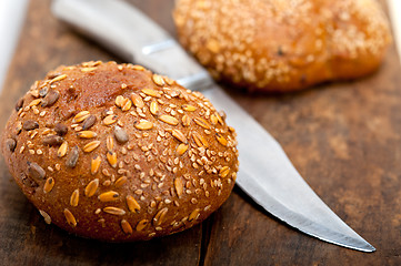 Image showing organic bread over rustic table