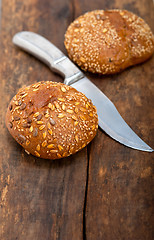 Image showing organic bread over rustic table