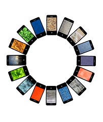 Image showing Modern mobile phones with different images