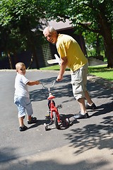 Image showing happy grandfather and child in park