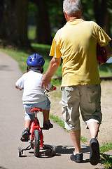 Image showing happy grandfather and child in park