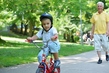 Image showing happy grandfather and child in park