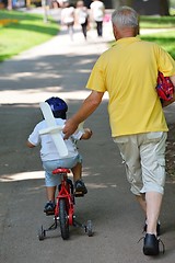 Image showing happy grandfather and child in park