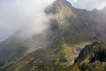 Image showing Mountain view covered with a cloud