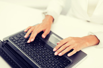 Image showing businesswoman using her laptop computer